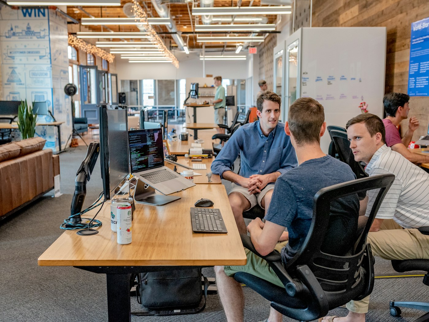 Recruiters reviewing candidate profiles in a meeting